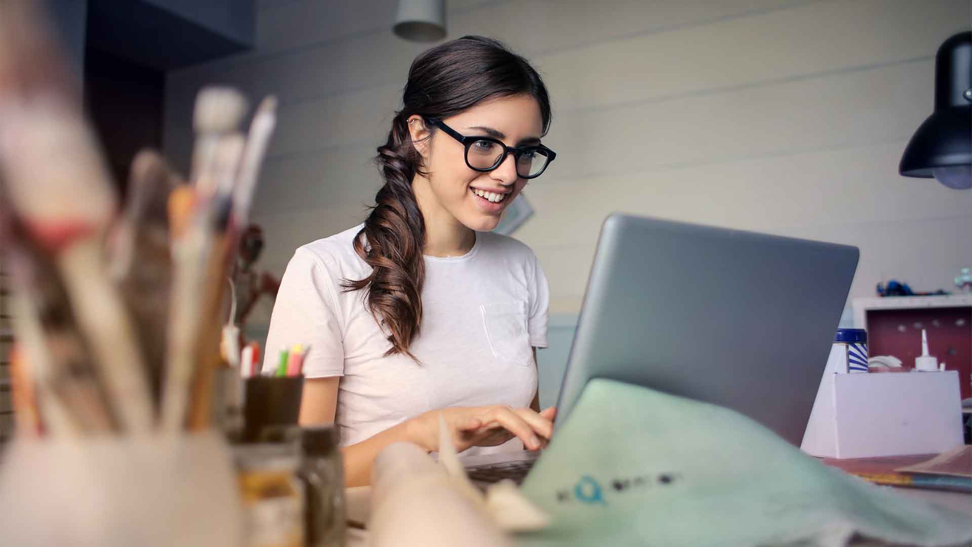 Digital marketing expert working on SEO strategies at a laptop.